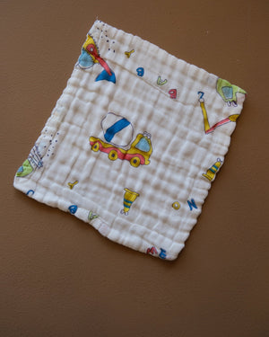 Six-layer white muslin baby face towel with assorted colorful printed designs