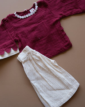Girls' purple floral-trim top with coordinating off-white pants