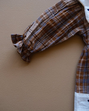 Baby plaid frock with contrasting Peter Pan collar and gathered skirt