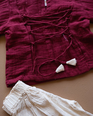 Girls' purple floral-trim top with coordinating off-white pants