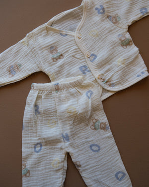 Pale blue baby clothing set with bear and letter prints