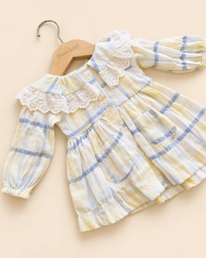Pastel plaid girls' frock with lace-trimmed collar and long sleeves