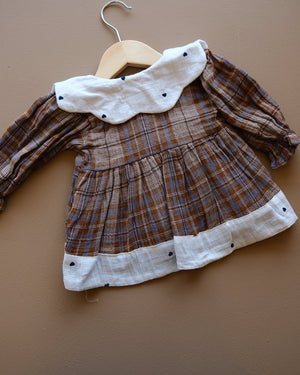 Baby plaid frock with contrasting Peter Pan collar and gathered skirt