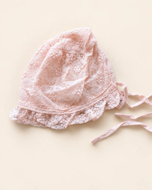 Delicate floral lace baby bonnet with tie straps