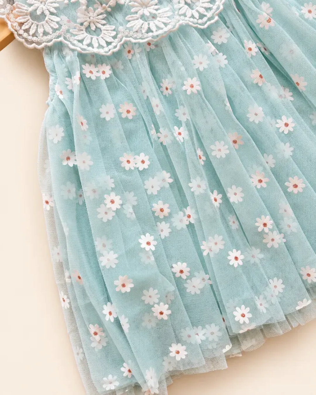 Floral daisy frock in mint green and blush pink with an embroidered lace collar