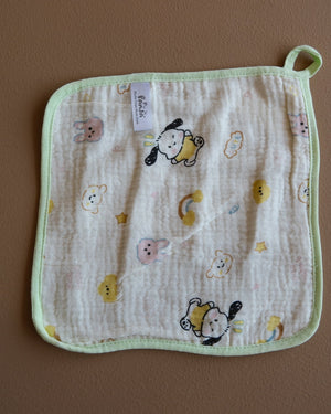 Assorted printed baby washcloths with colorful animal, floral, rainbow, and playful designs