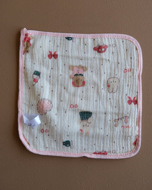 Muslin crepe baby washcloth with pastel animal and heart prints