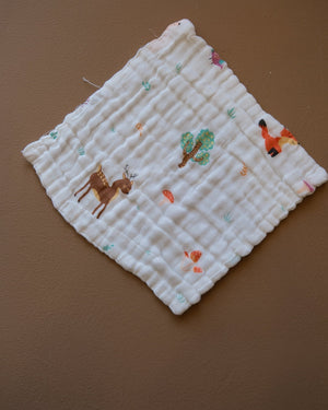 Six-layer white muslin baby face towel with assorted colorful printed designs