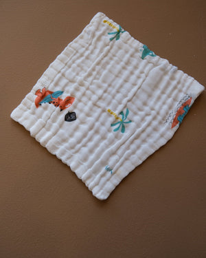 Six-layer white muslin baby face towel with assorted colorful printed designs
