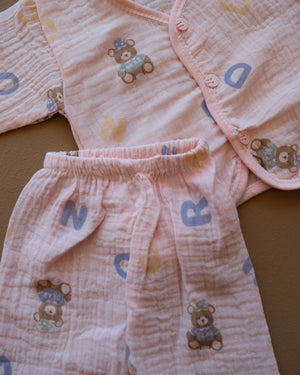 Pale blue baby clothing set with bear and letter prints