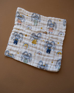 Six-layer white muslin baby face towel with assorted colorful printed designs