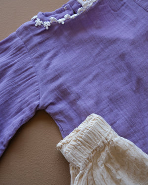 Girls' purple floral-trim top with coordinating off-white pants