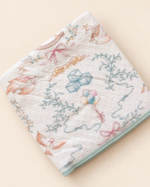 Printed white baby dry sheet with quilted texture and playful nursery illustrations