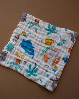 Six-layer white muslin baby face towel with assorted colorful printed designs