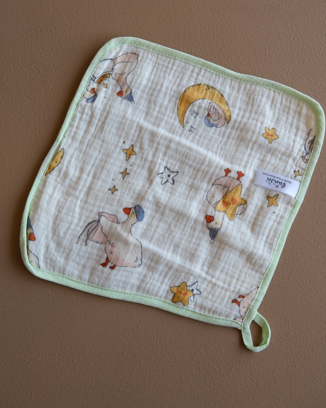 Muslin crepe baby washcloth with pastel animal and heart prints