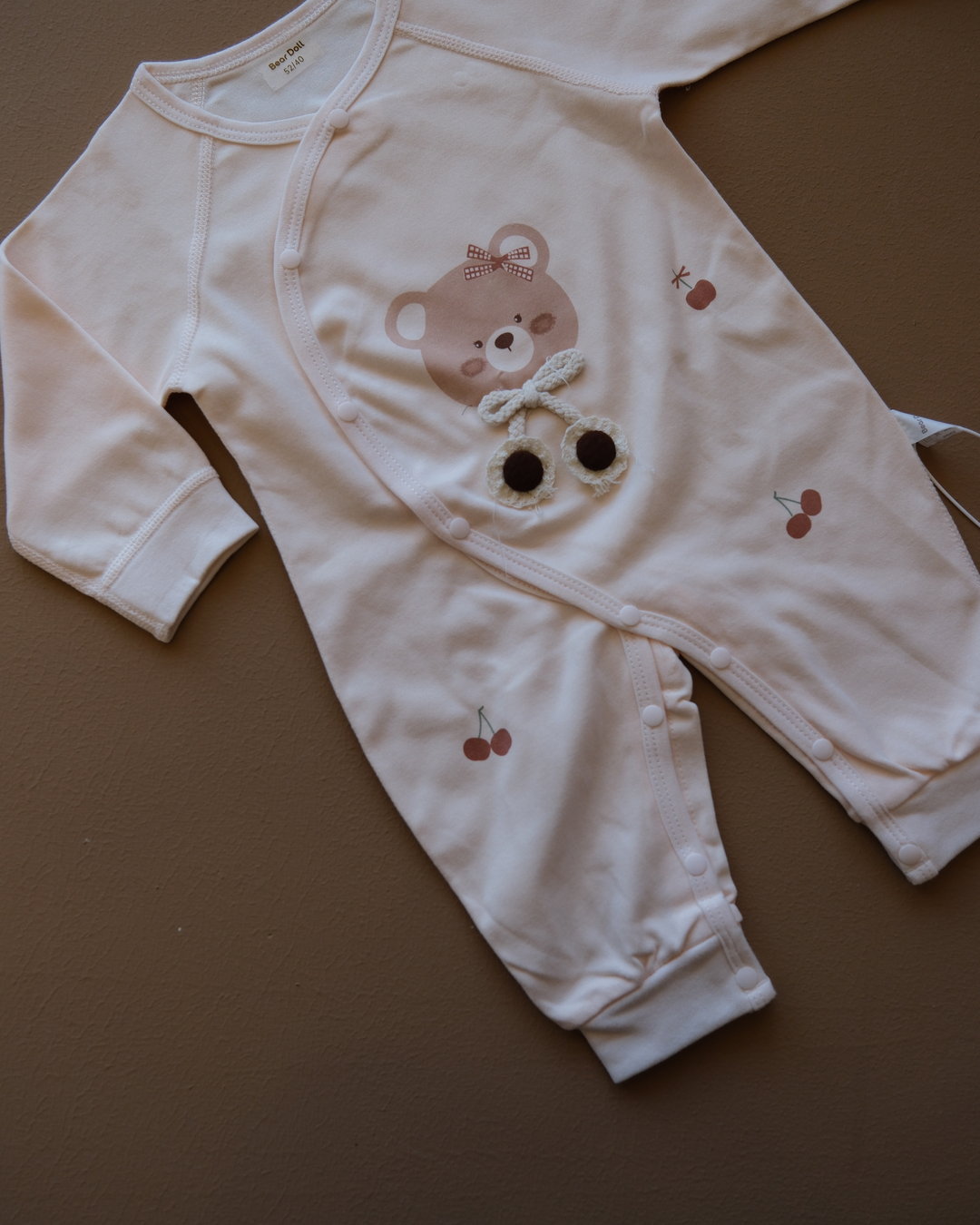 Long-sleeve baby cotton sleepsuit with bear and cherry prints