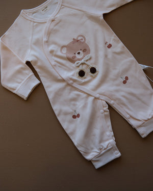 Long-sleeve baby cotton sleepsuit with bear and cherry prints