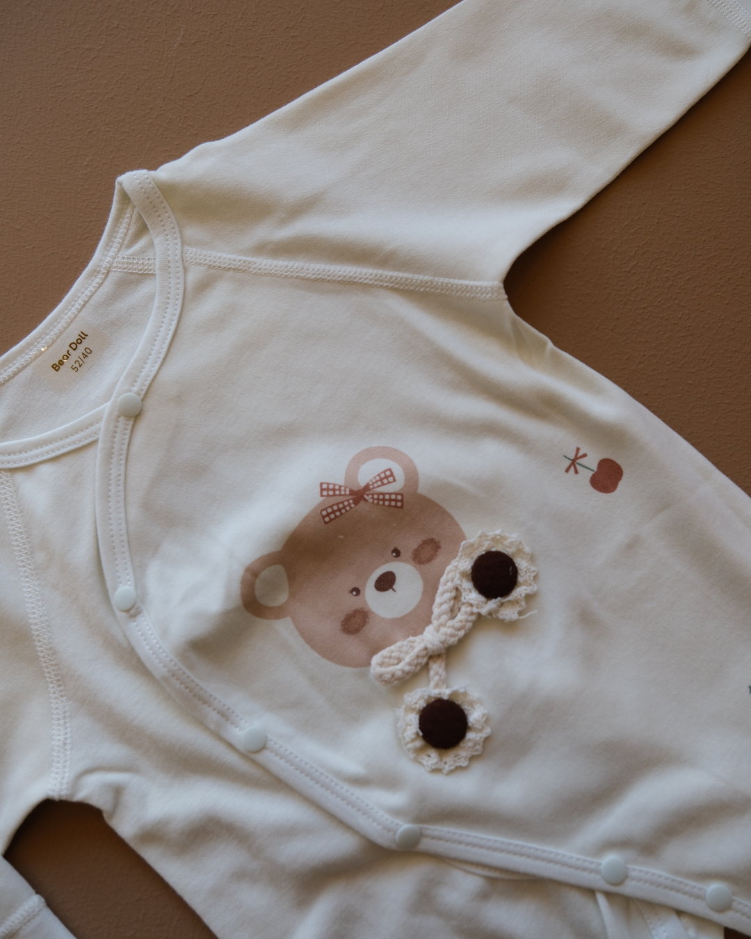 Long-sleeve baby cotton sleepsuit with bear and cherry prints