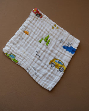Six-layer white muslin baby face towel with assorted colorful printed designs