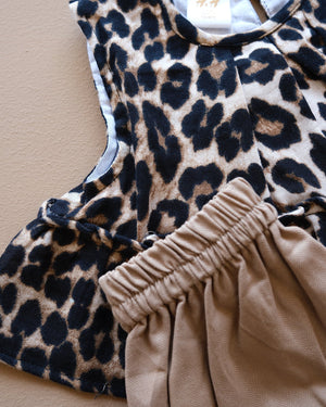 Leopard-print sleeveless top with beige shorts two-piece outfit