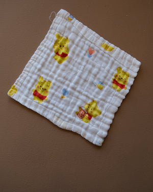 Six-layer white muslin baby face towel with assorted colorful printed designs