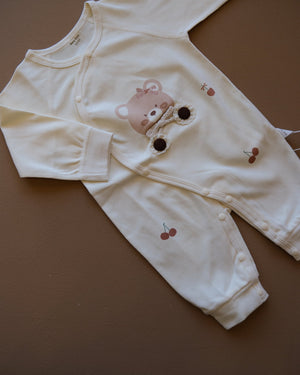 Long-sleeve baby cotton sleepsuit with bear and cherry prints