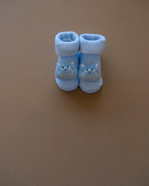 Assorted pastel baby socks with embroidered animal faces