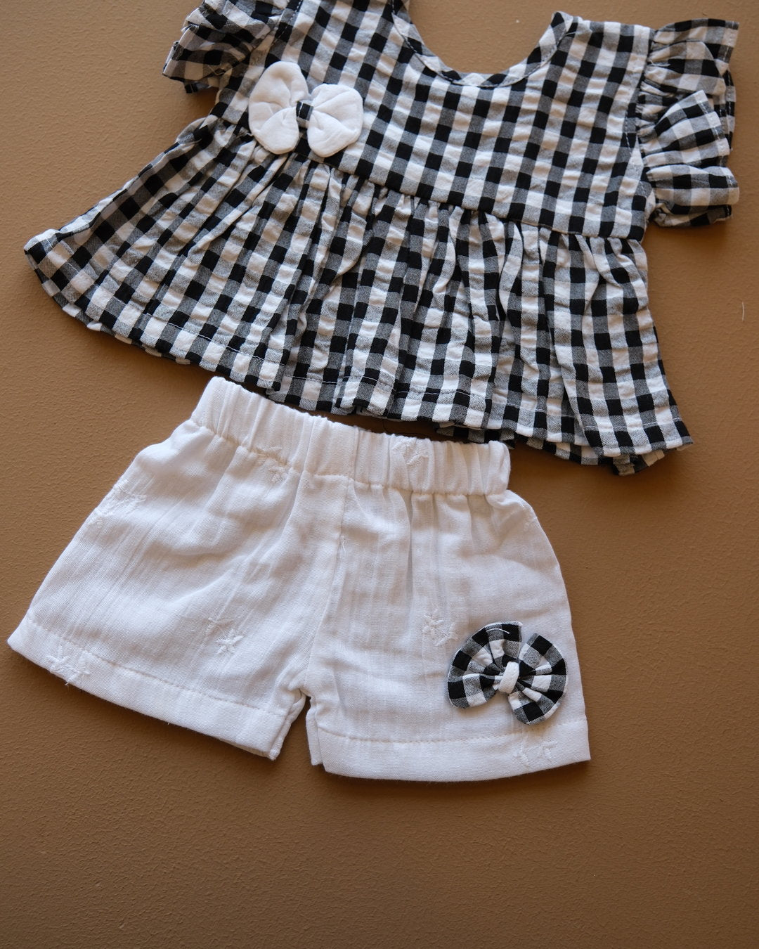 Black and white gingham girls frock set with bow detail and matching white shorts