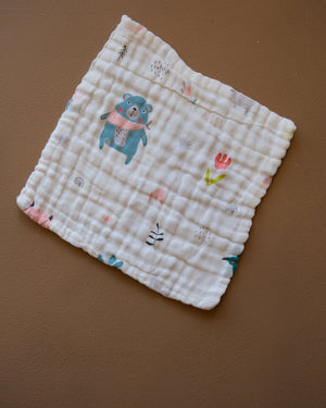 Six-layer white muslin baby face towel with assorted colorful printed designs