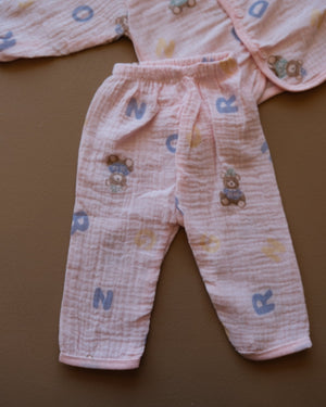 Pale blue baby clothing set with bear and letter prints