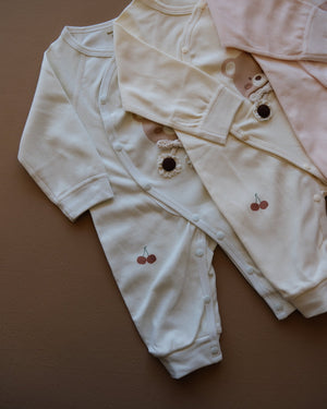 Long-sleeve baby cotton sleepsuit with bear and cherry prints