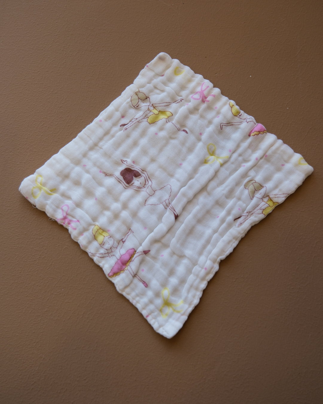 Six-layer white muslin baby face towel with assorted colorful printed designs