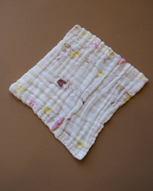 Six-layer white muslin baby face towel with assorted colorful printed designs