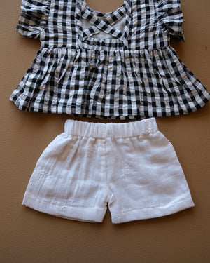 Black and white gingham girls frock set with bow detail and matching white shorts