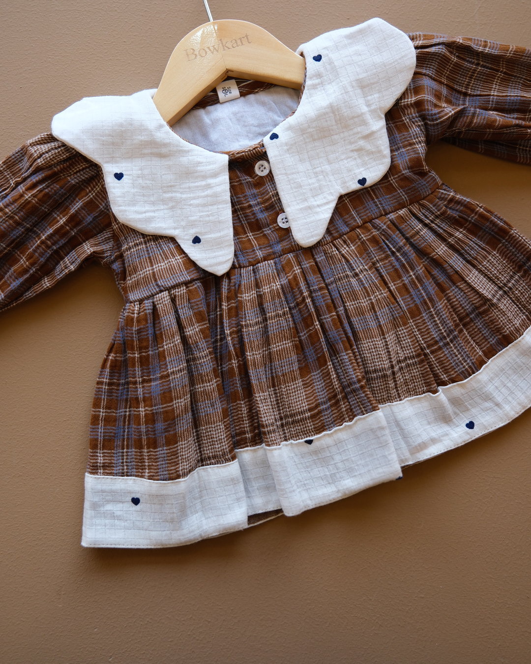 Baby plaid frock with contrasting Peter Pan collar and gathered skirt