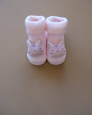 Assorted pastel baby socks with embroidered animal faces