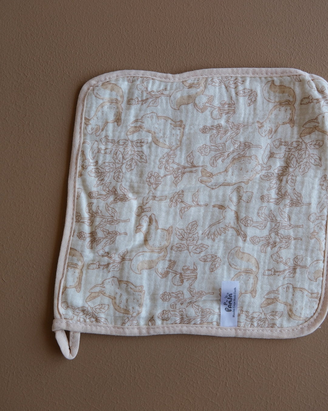 Muslin crepe baby washcloth with pastel animal and heart prints