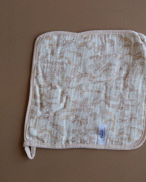 Muslin crepe baby washcloth with pastel animal and heart prints