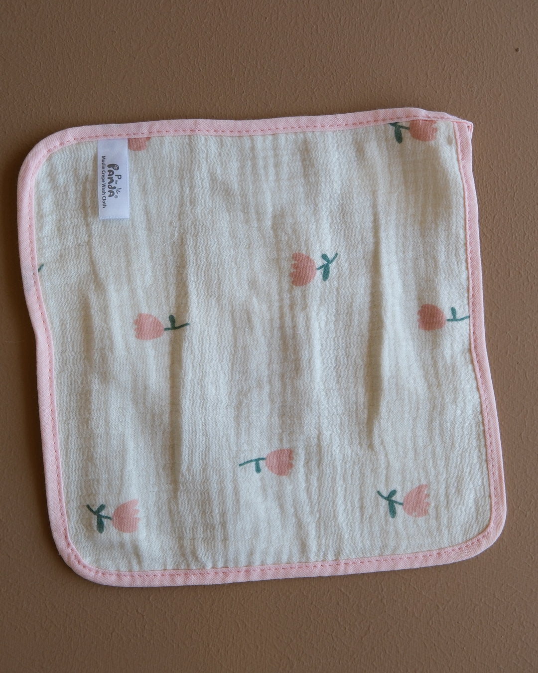 Muslin crepe baby washcloth with pastel animal and heart prints