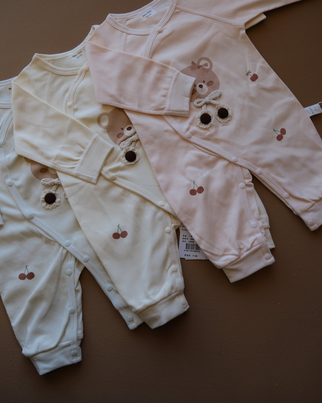 Long-sleeve baby cotton sleepsuit with bear and cherry prints