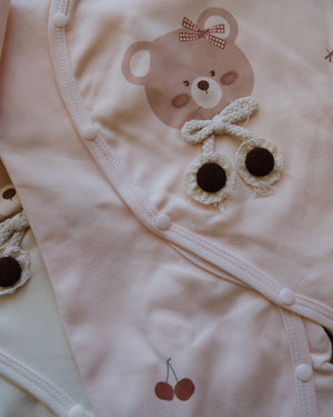 Long-sleeve baby cotton sleepsuit with bear and cherry prints