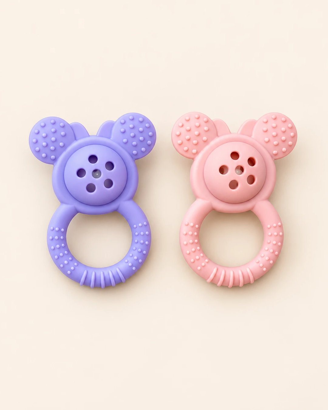 Lavender and pink textured ring teethers with raised dot details