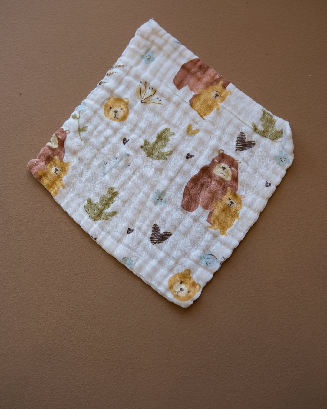 Six-layer white muslin baby face towel with assorted colorful printed designs