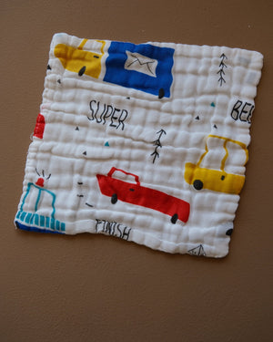 Six-layer white muslin baby face towel with assorted colorful printed designs