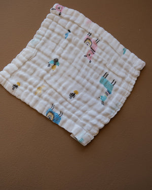 Six-layer white muslin baby face towel with assorted colorful printed designs