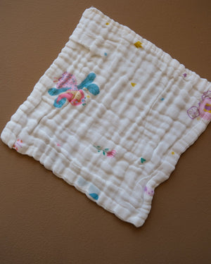 Six-layer white muslin baby face towel with assorted colorful printed designs