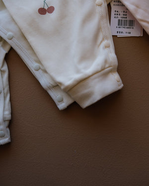 Long-sleeve baby cotton sleepsuit with bear and cherry prints