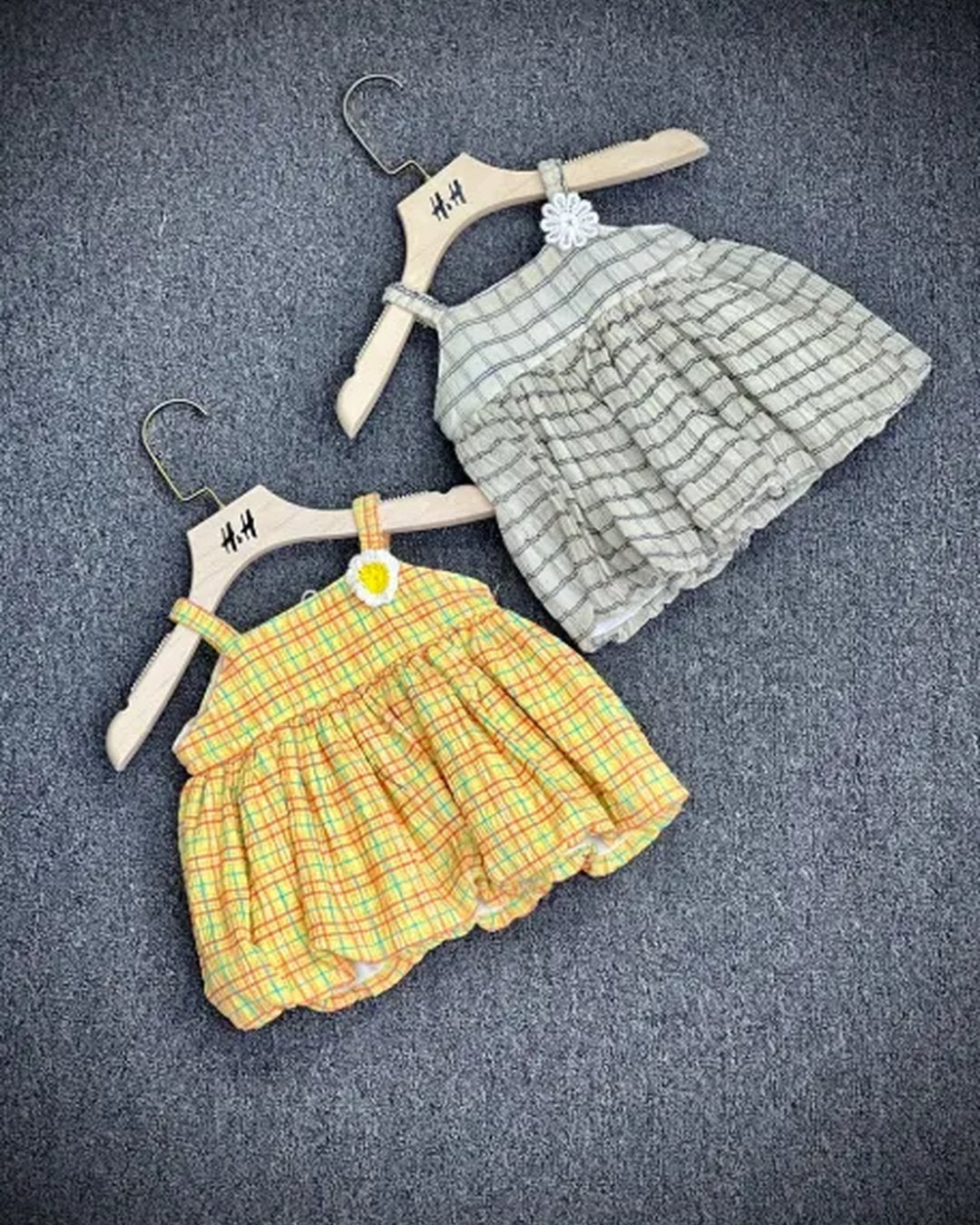 Baby sleeveless plaid bubble frock with floral accent
