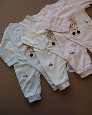 Long-sleeve baby cotton sleepsuit with bear and cherry prints