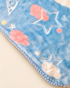 Blue and pink baby blanket with star, moon and cloud patterns